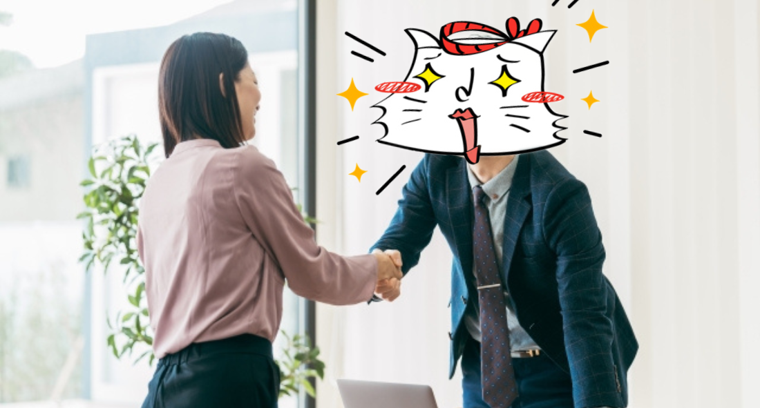 クライアントと握手をしている
